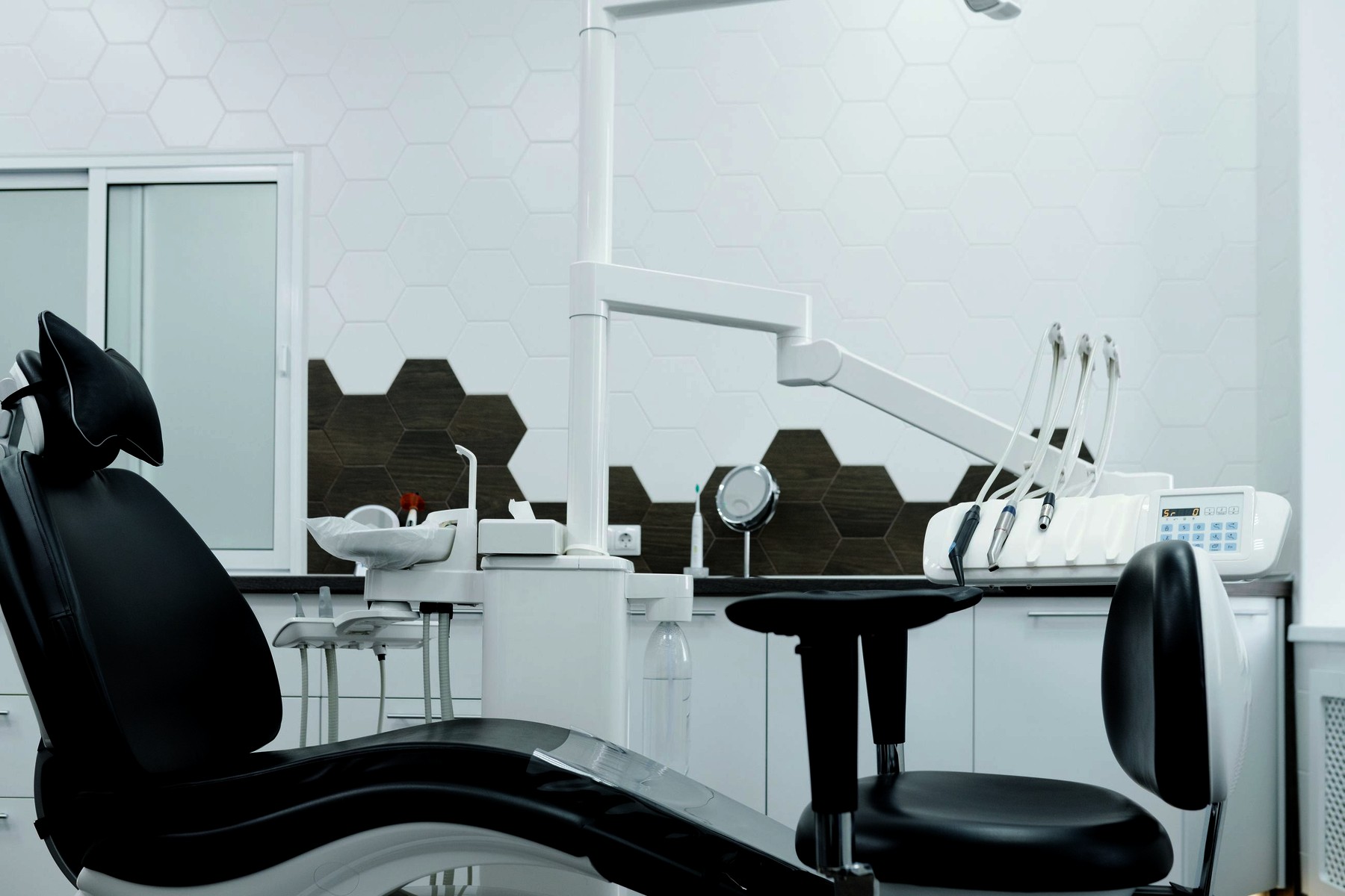 A clean, fully equipped dental treatment room in a Cambridge medical suite